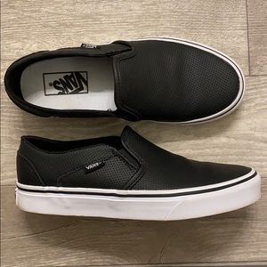 Women’s black leather Vans